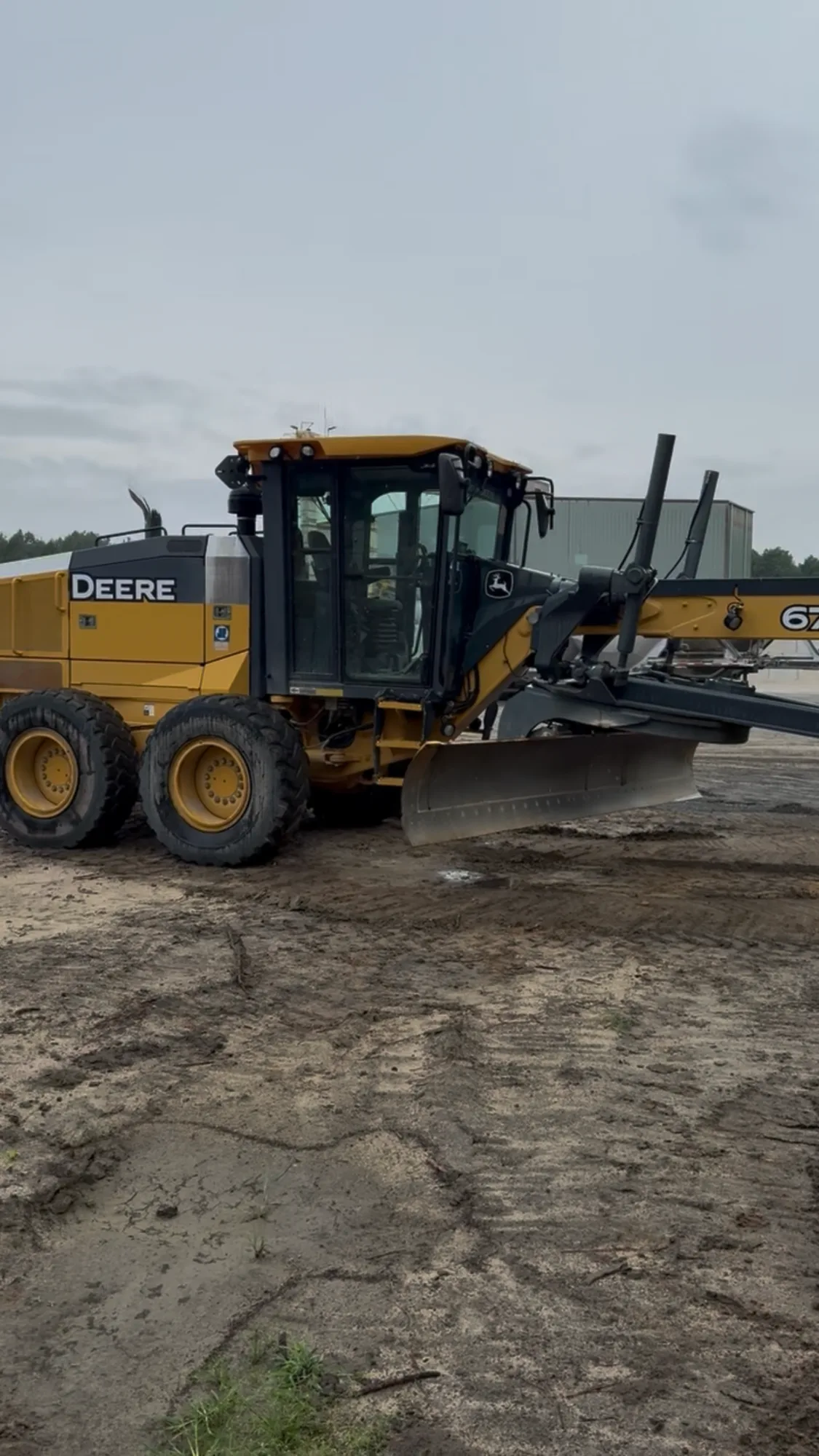 Ward Excavation John Deere motor grader staged at the company's Whiteville, NC equipment yard.